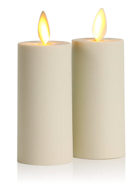 Luminara moving flame votive candles in ivory glow on the dining table.