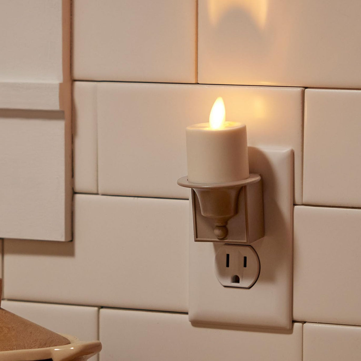 Luminara wall plug night light in timeless taupe for safe hallway lighting.