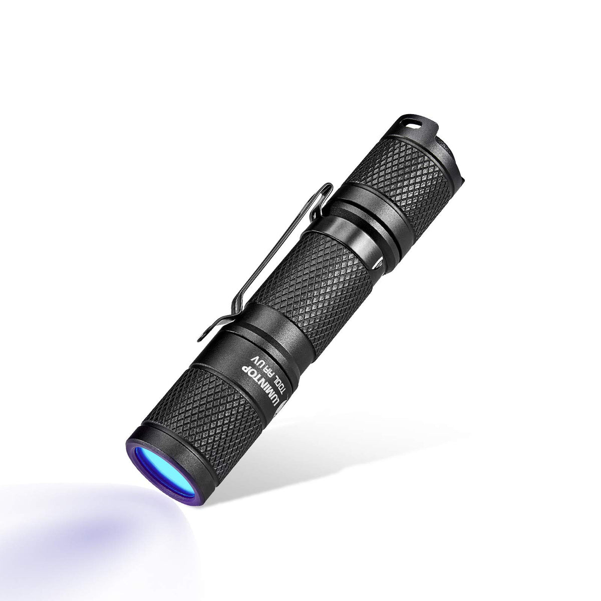 LUMINTOP Tool AA UV flashlight beam reveals hidden fluorescents for stain detection.