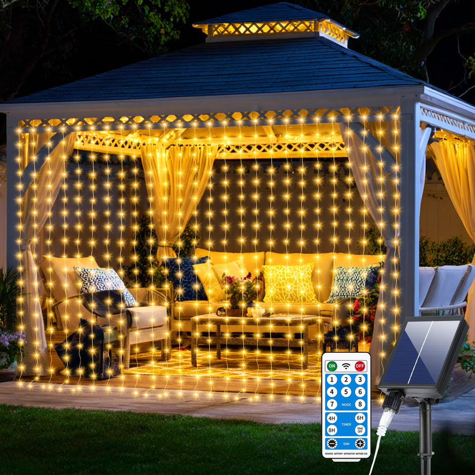 Lumry Go upgraded solar curtain lights framing a 10x10ft backdrop for outdoor ambiance.