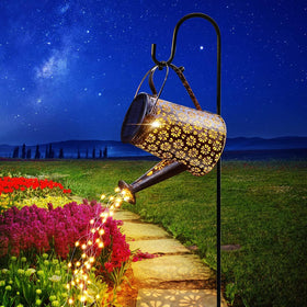 Lureshine solar watering can with lights brightens the garden at dusk