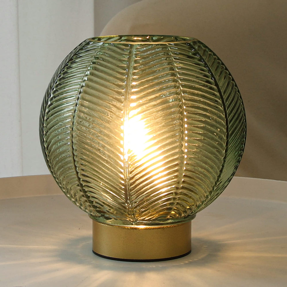 LUSHARBOR battery-operated lamp with green glass shade; versatile cordless lighting for any room.