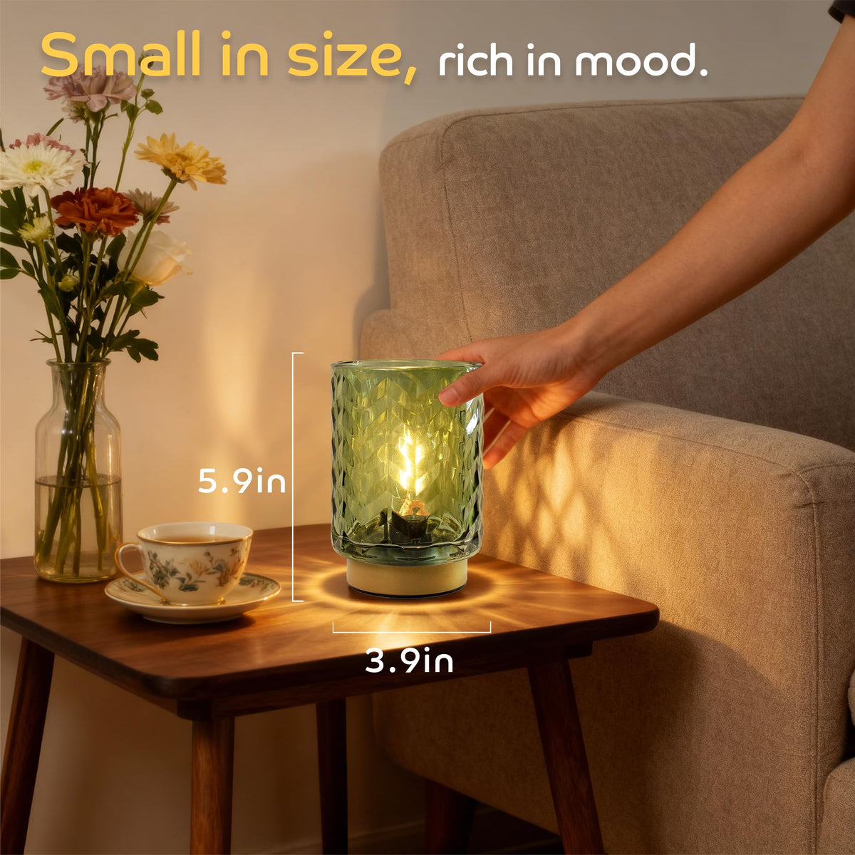 Emerald green glass lamp brightening a dorm desk without outlets