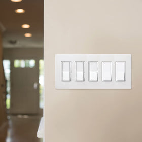 Lutron Claro wall plate hides gaps around wall boxes for a neat look.
