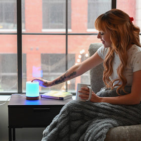 LuvLink glowing pairs in different rooms to symbolize connection.
