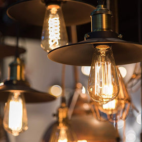 LUXON amber glow lighting over a kitchen island setup