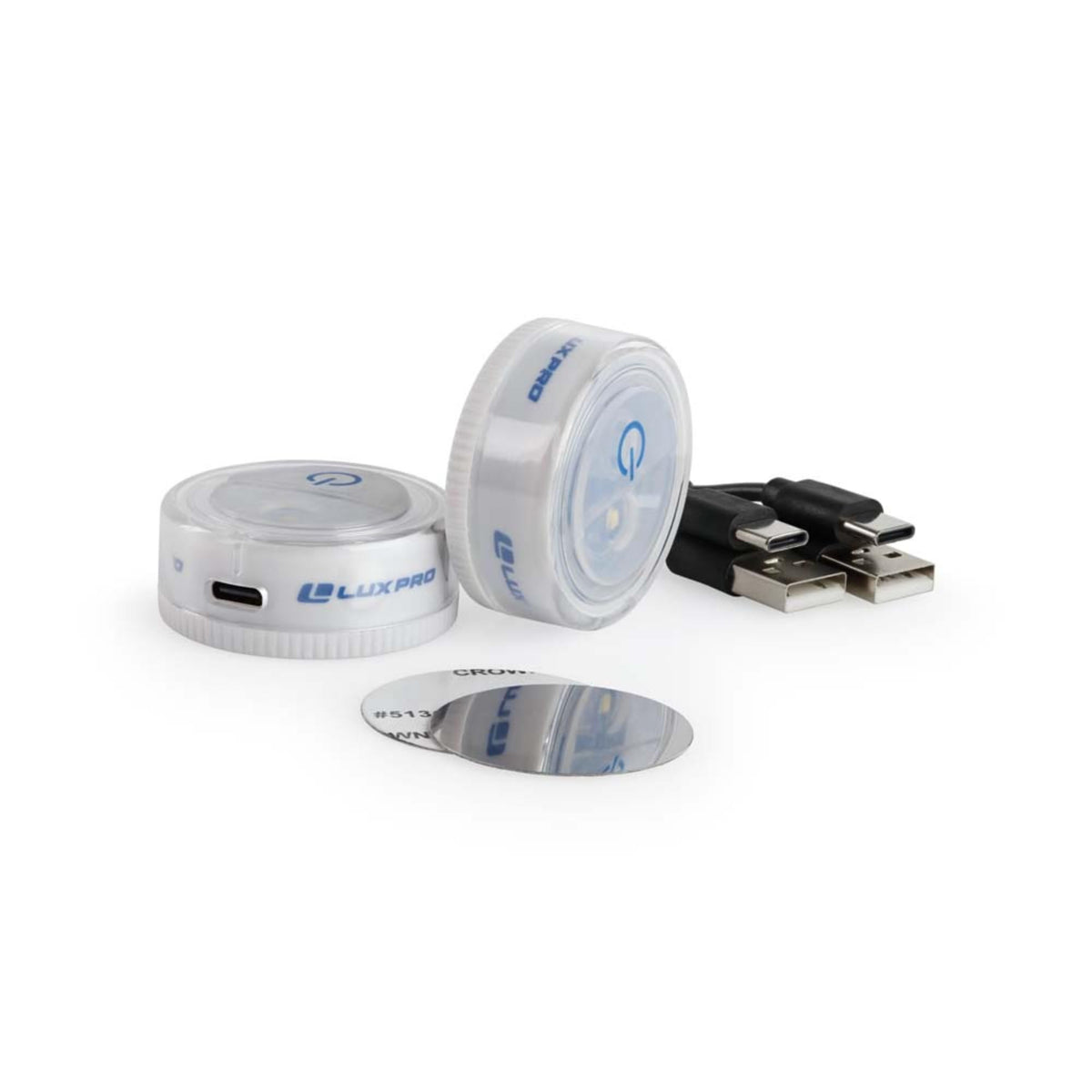 LuxPro rechargeable puck light charging via USB for cordless use.