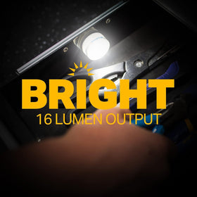 LuxPro waterproof micro LED puck light in tackle box keeps gear visible, no cords.