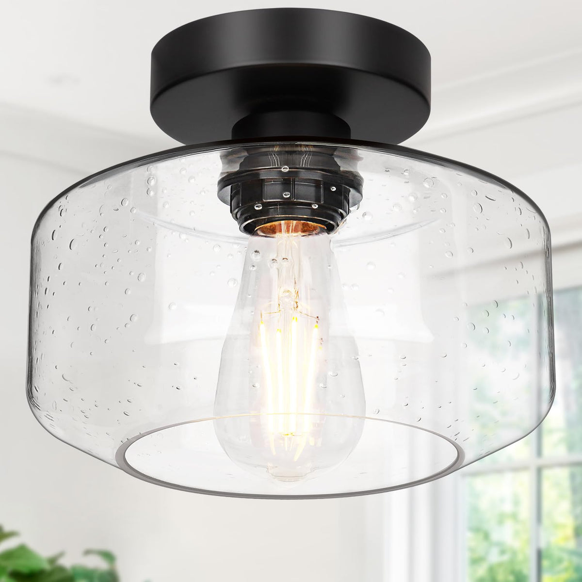 Lynnoland industrial semi-flush light with seeded-glass shade casts soft ceiling shadows.