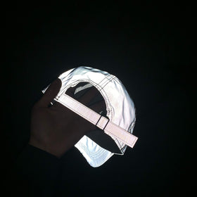 LZLRUN reflective hat worn on head for outdoor use.