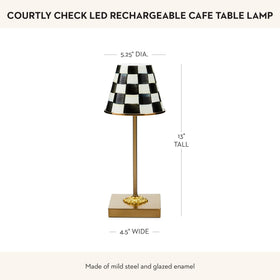 MacKenzie-Childs lamp offers three light levels for mood-adjusting brightness.
