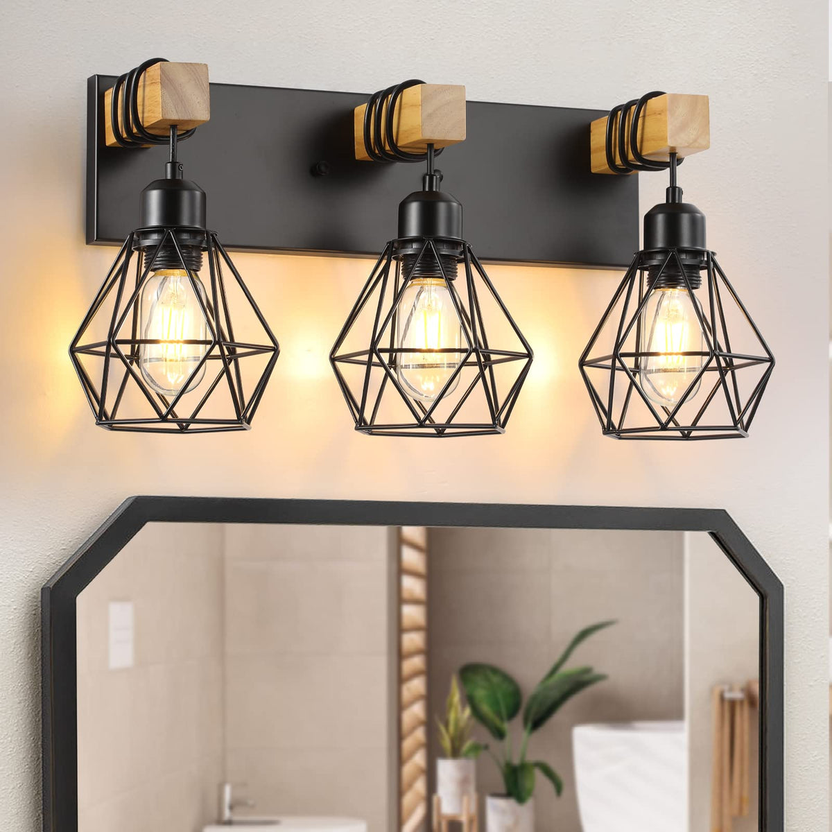 Maesta 3-light farmhouse vanity light over mirror for warm bathroom ambiance