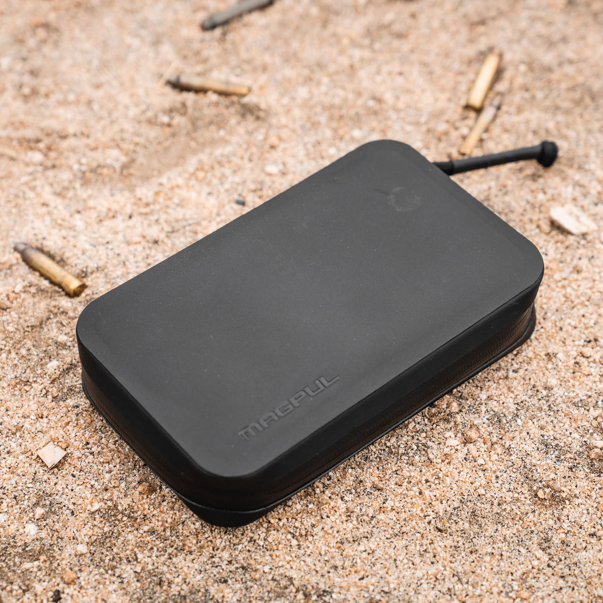 Magpul DAKA carabiner pass-through enables quick access while clipped to gear.