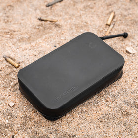 Magpul DAKA carabiner pass-through enables quick access while clipped to gear.