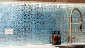 Main Street teal-silver leaves pattern tile in kitchen for quick updates.