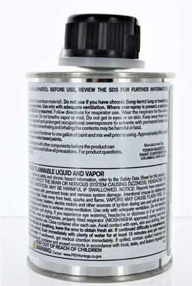 Majic hardener bottle on workspace; ideal for household painting projects and finishes.