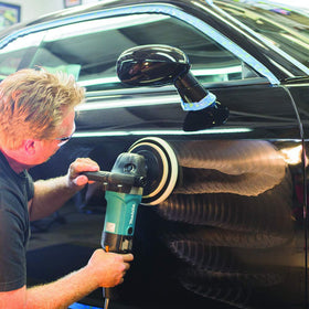Makita 9237CX3 in use for automotive and stone surface polishing applications