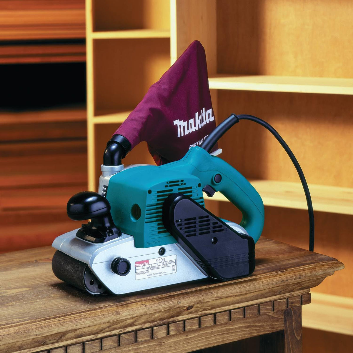 Makita 9403 four-inch belt in action for fast material removal