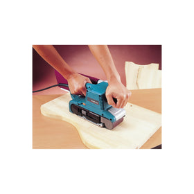 Makita 9903 belt sander side view emphasizing balanced control.