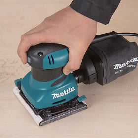 Makita BO4556K sander with dust collection keeps your workspace clean.