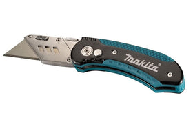 Makita Quick Change Folding Knife folded for compact storage and portability.