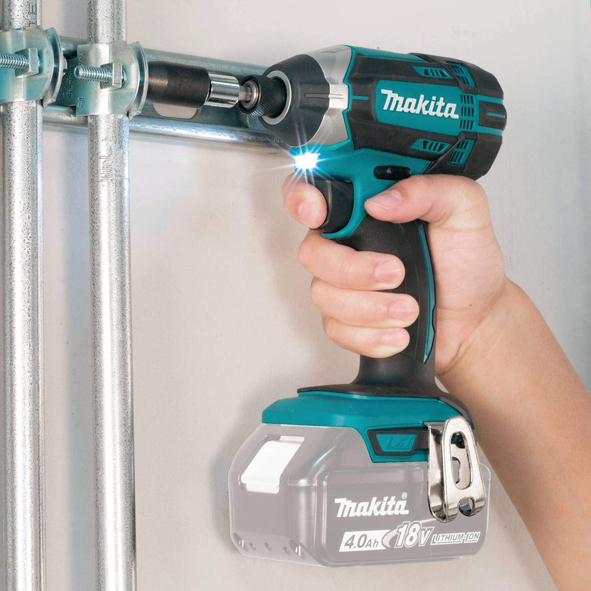 Makita XDT11Z metal gear housing enhances job-site durability.