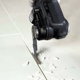 Makita XMT04ZB compact barrel grip for comfortable one-handed use.