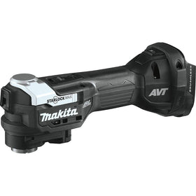 Makita XMT04ZB oscillating tool cutting action for precise remodeling tasks.