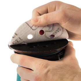 Makita XOB01Z quick-change 8-hole papers simplify setup and reduce clogging