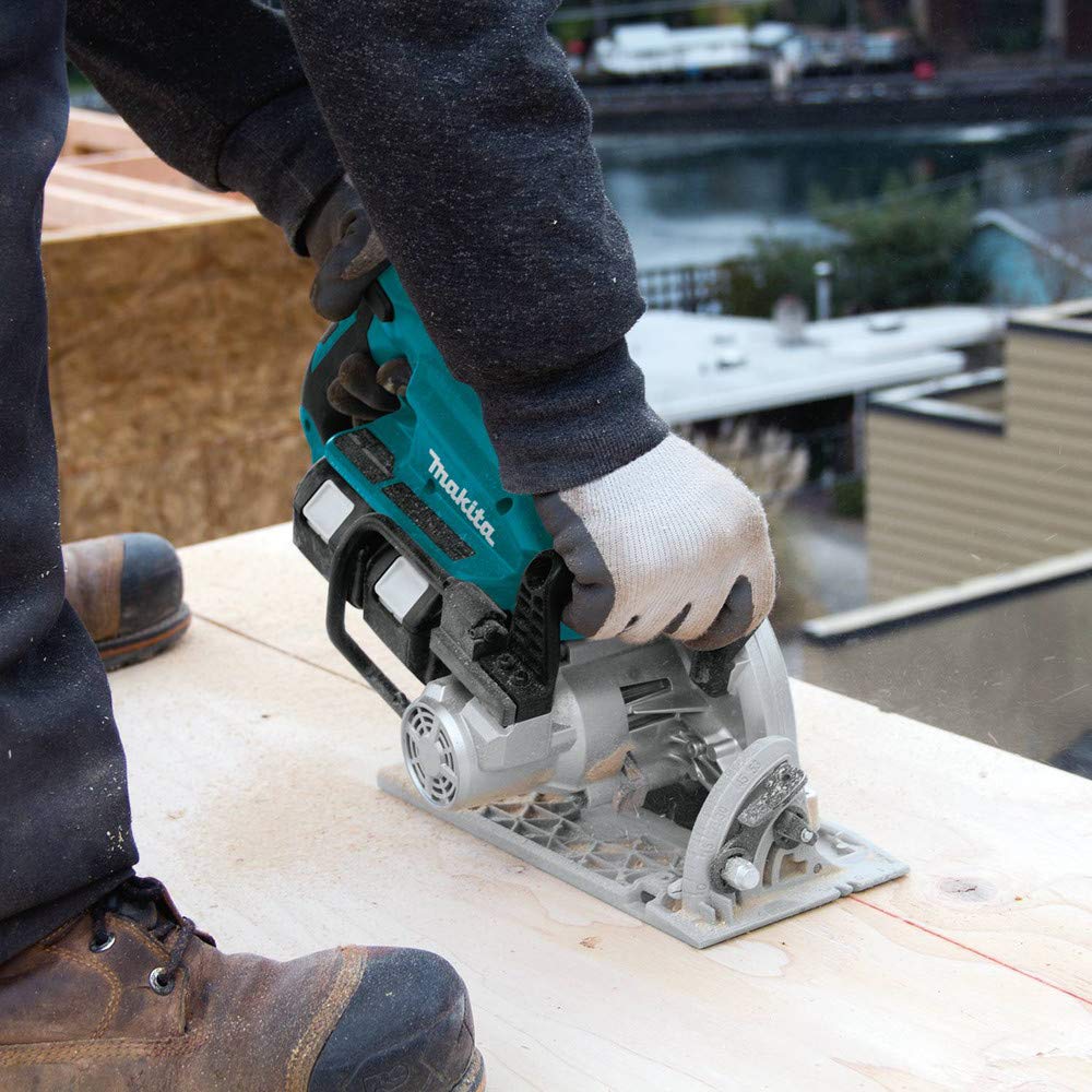 Makita XSR01PT two 5.0Ah batteries extending runtime on site.