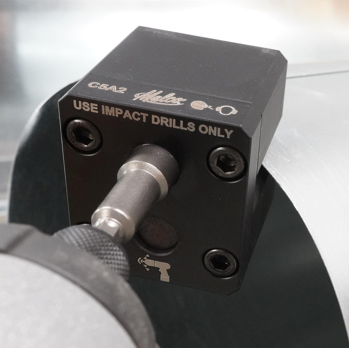 Malco C5A2 chucked into a 1/4-inch hex for quick start