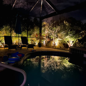 Malibu Low Voltage Floodlight warm white 2800K for inviting nighttime ambiance.