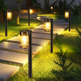 Mancra solar path light with clear glass shade for bright walkway illumination.