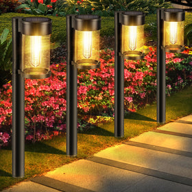 Mancra solar path light with included stakes for quick ground installation.
