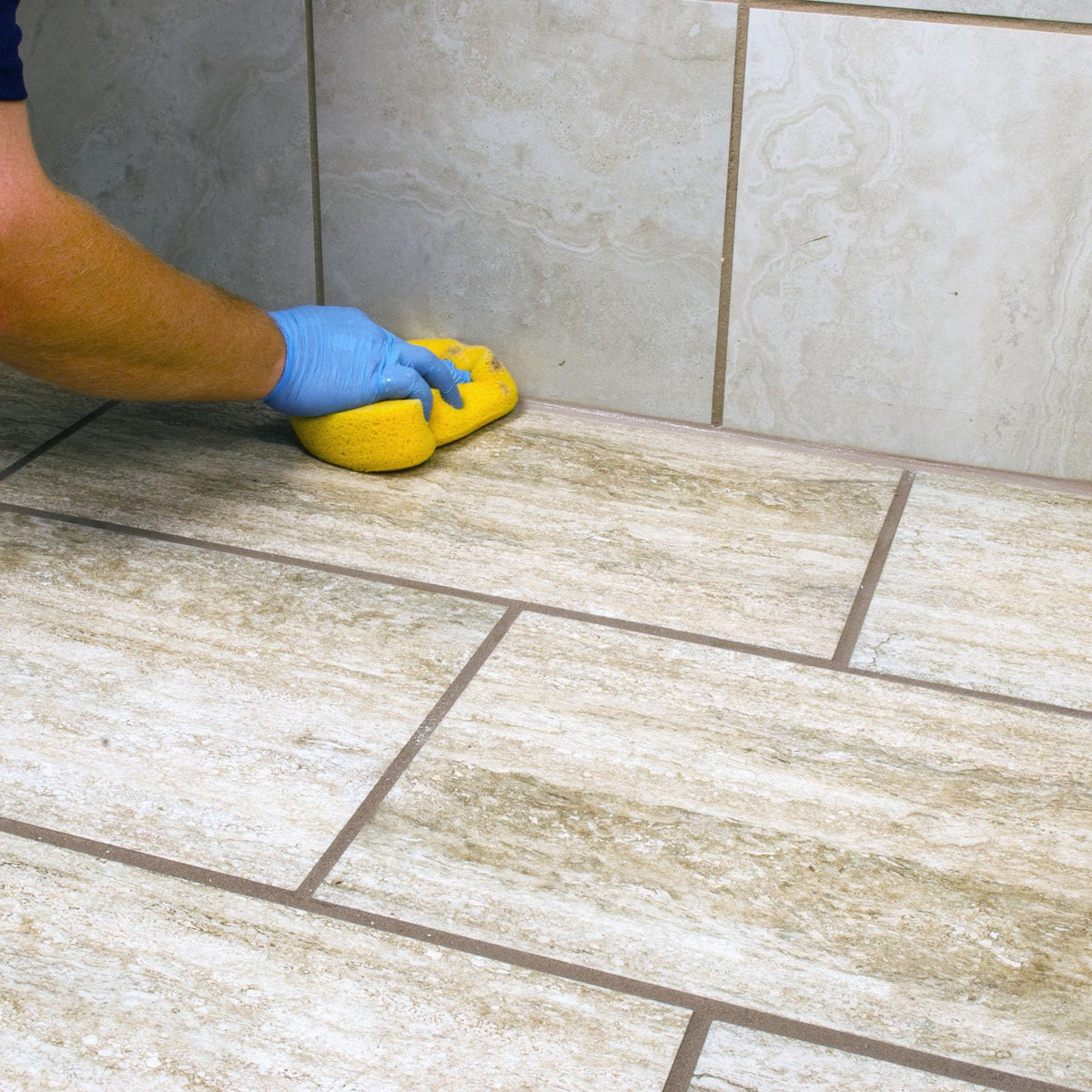 Mapei Keracaulk S precision-sealing around tight tile joints