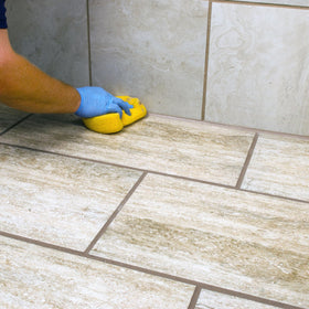 Mapei Keracaulk S precision-sealing around tight tile joints