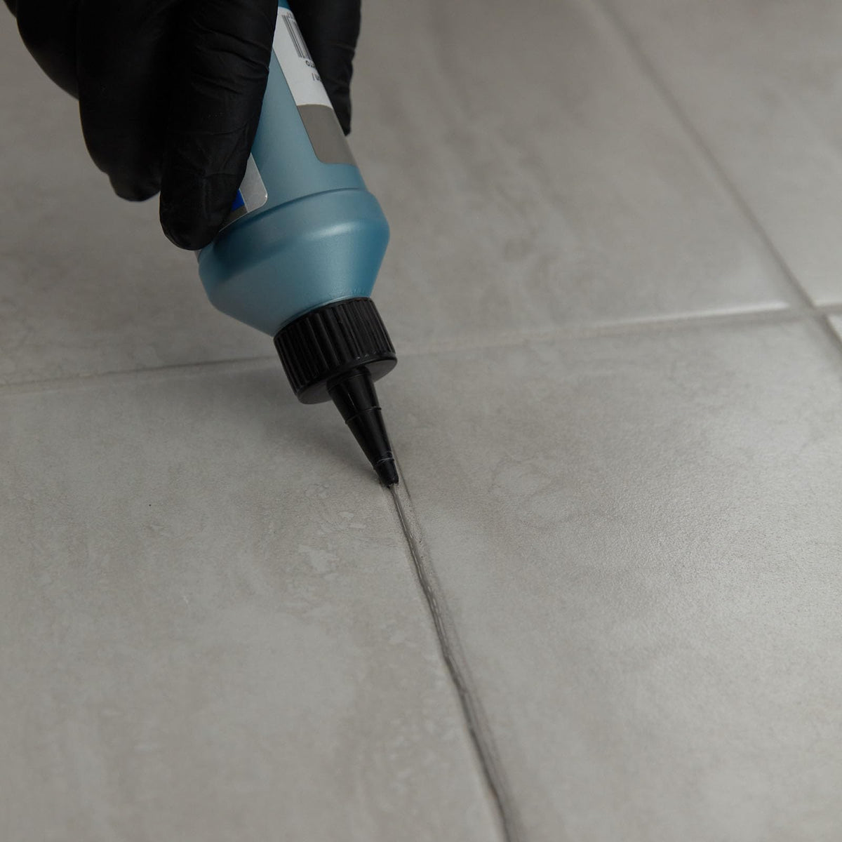 MAPEI UltraCare Grout Refresh applicator tip detail enables precise, mess-free color application.