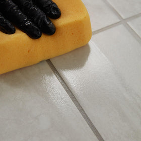 MAPEI UltraCare Grout Refresh kitchen grout before/after illustrates refreshed surfaces.
