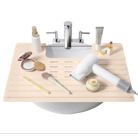Maplefield bathroom sink cover enhances counter-space organization for daily beauty routines.