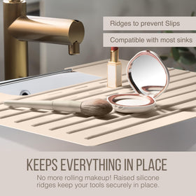 Maplefield beige silicone surface-protector helps maintain clear counters after styling.