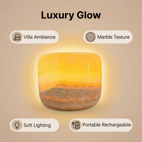 Marmor Marble Lamp beside the bed creates serene bedside ambiance.