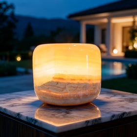 Marmor Marble Lamp on a bedside table with touch control for calming bedtime ambience.