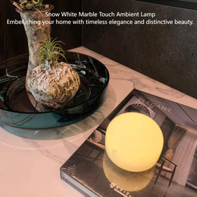 Marmor Marble Lamp with touch-control dimming for easy brightness adjustment.