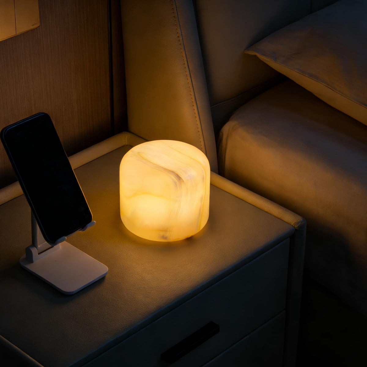 Marmor portable lamp fits desks and tables for flexible lighting.