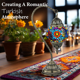 Marrakech lamp with bronze swan-neck base adds elegant bedside presence