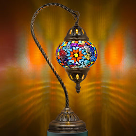 Marrakech Tiffany lamp with glass shade provides warm, colorful mood lighting for any room