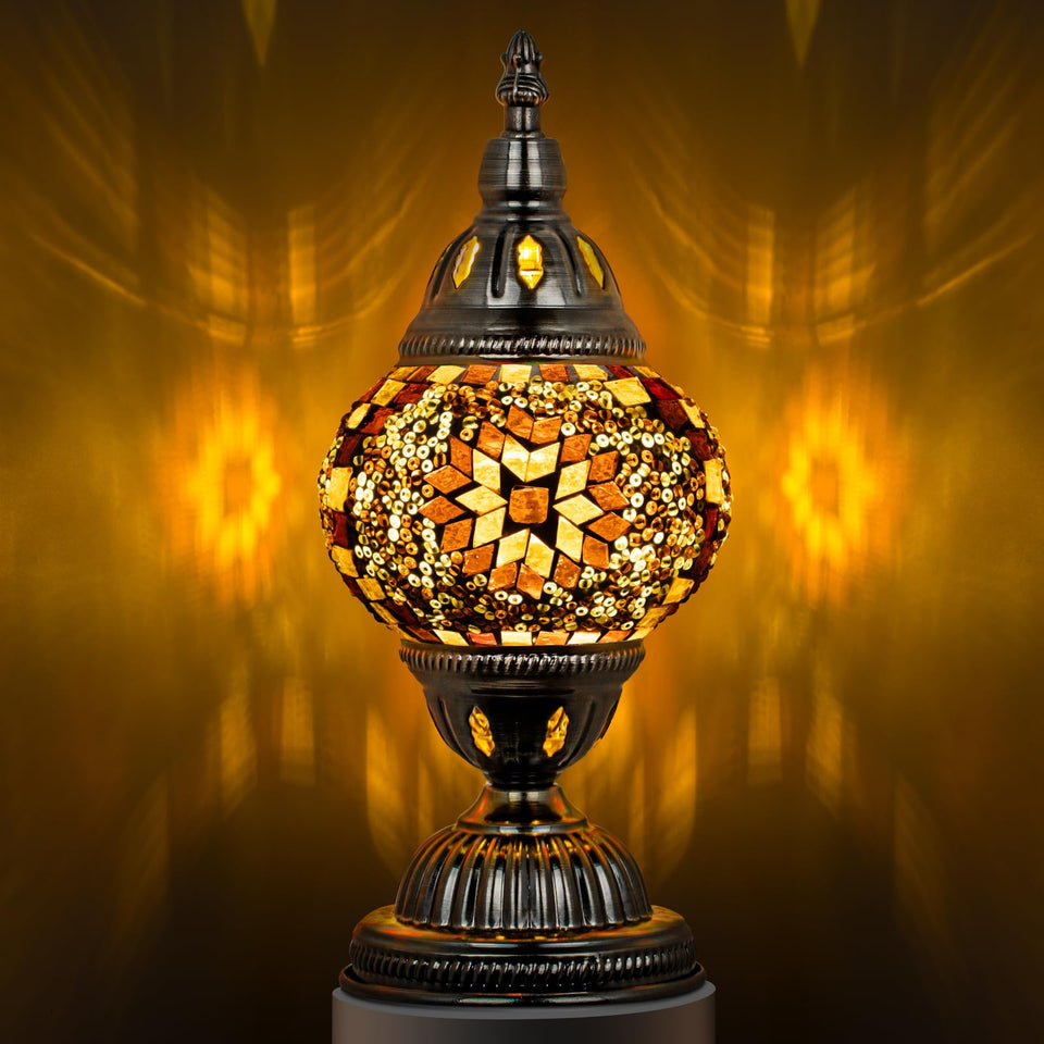 Marrakech Turkish table lamp with bronze base casts a warm glow in living rooms.