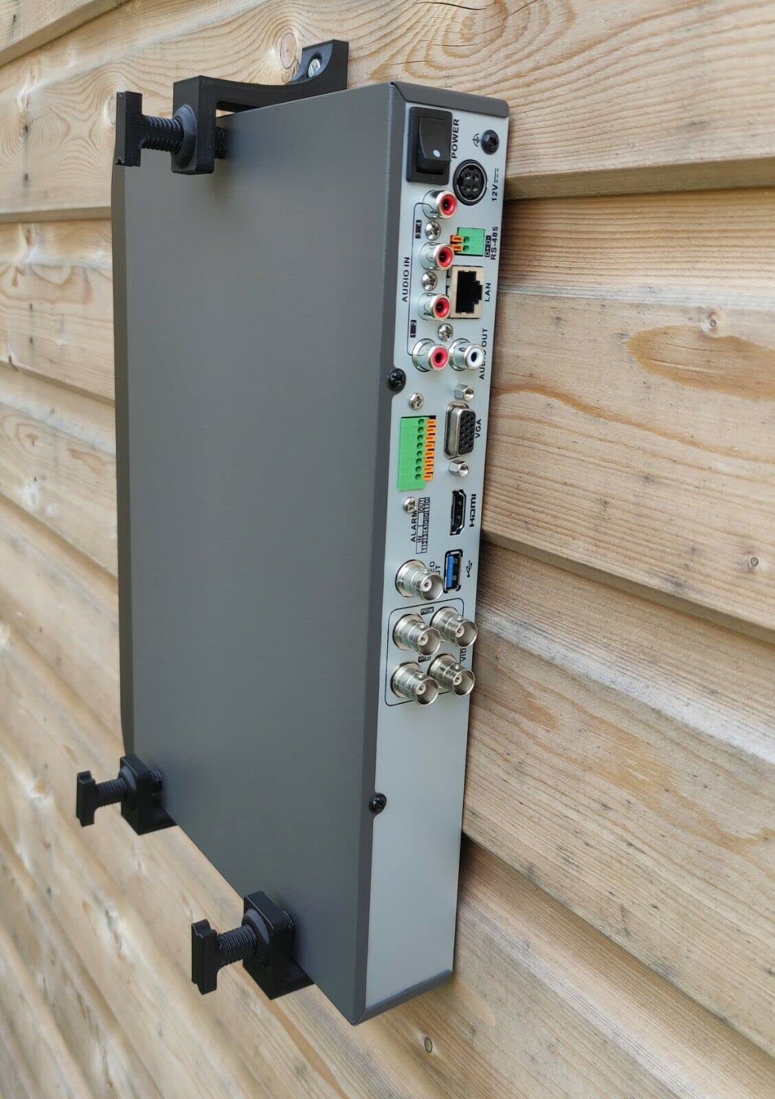 Mars Outpost adjustable wall bracket for media box helps discreet mounting behind furniture