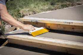 Marshalltown twelve-inch hardwood handle offers steady control during brushing tasks