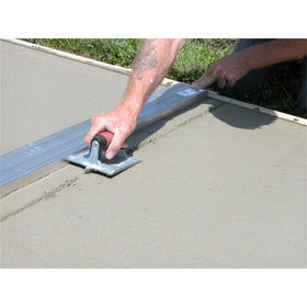 In-use shot showing precise grooves along a finished surface.